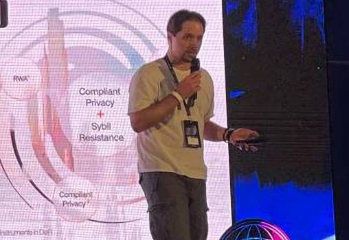 David Slade speaking on stage